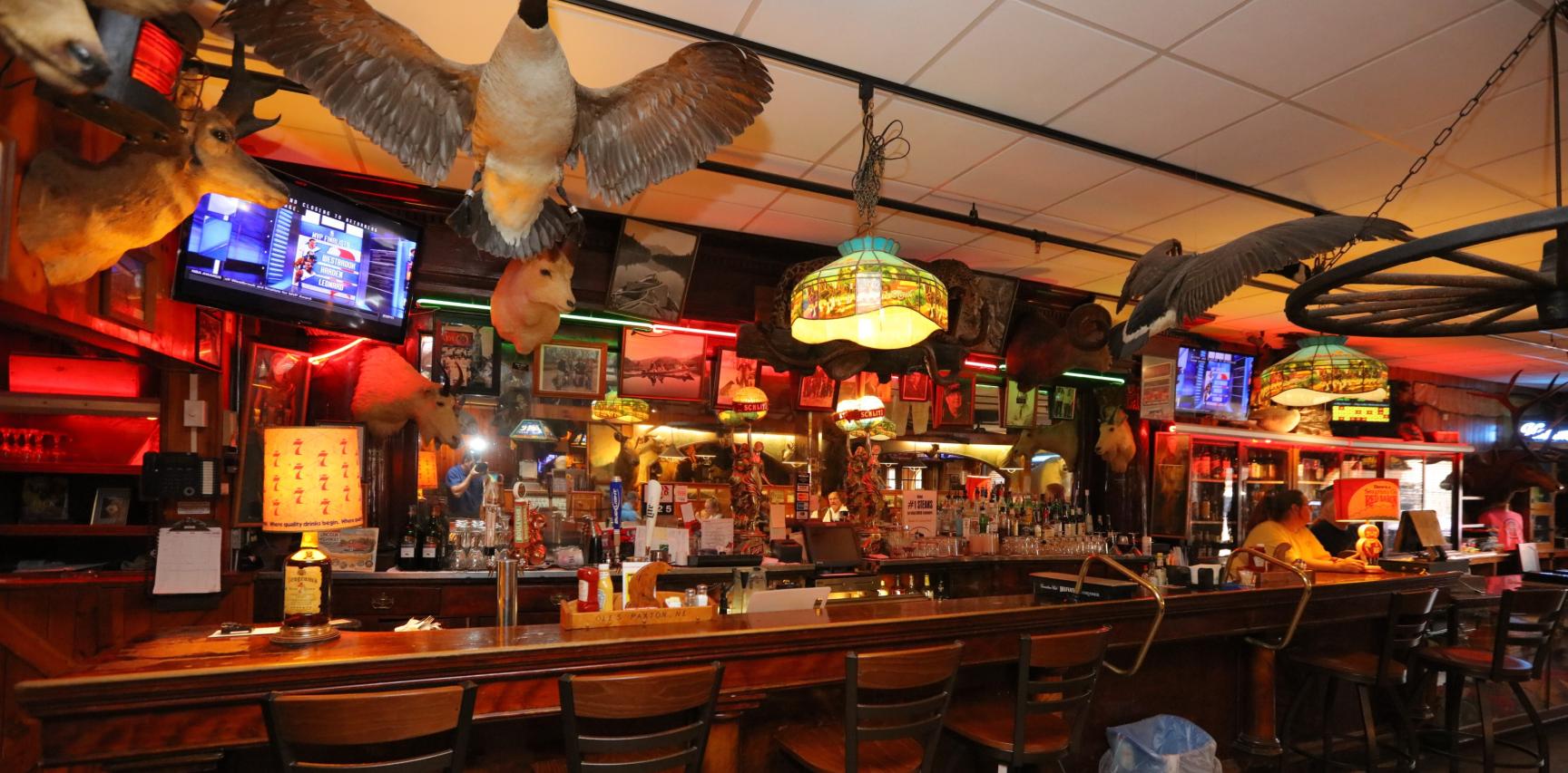 The bar and dining room surrounded by Ole’s wildlife collection.
