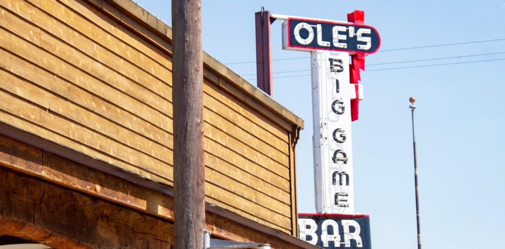 The tall Ole’s Big Game sign beside the steakhouse.
