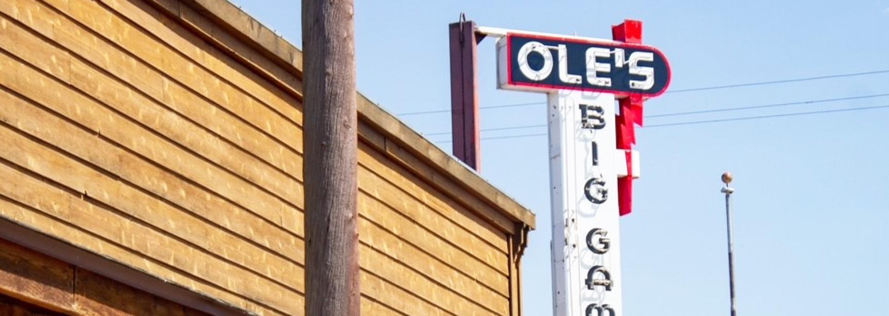 The tall Ole’s Big Game sign beside the steakhouse.