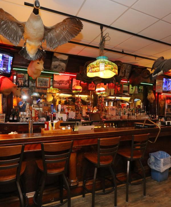 The bar and dining room surrounded by Ole’s wildlife collection.