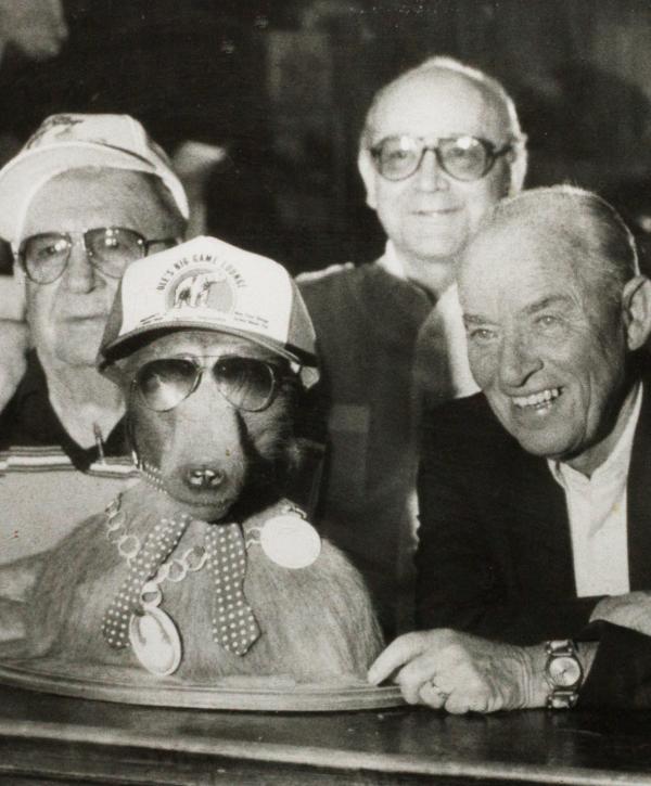 Historic photograph of guests smiling together at Ole’s.