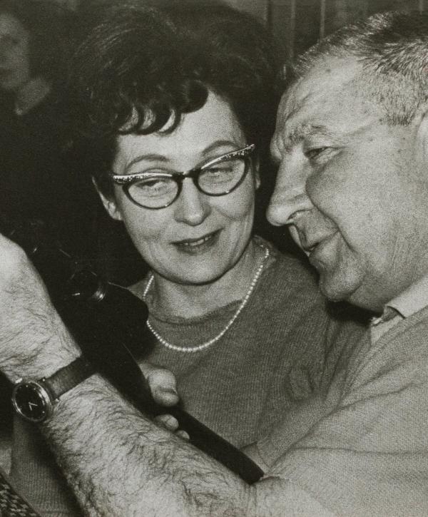 Historic photograph of a couple sharing a kiss.